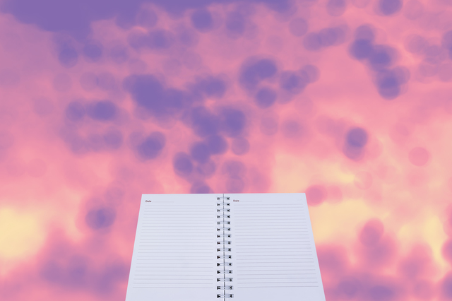 open note book with abstract background